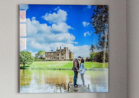 Stock style image of a metallic acrylic print hanging on the wall